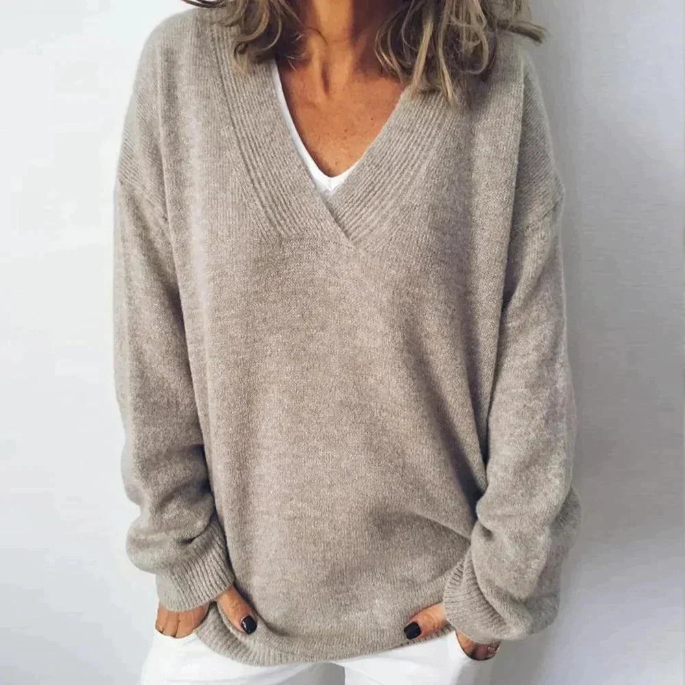 Cosy relaxed fit knit winter sweater with deep v-neckline in Beige