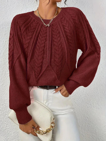 Women's crew neck winter cable knit sweater with varied pattern