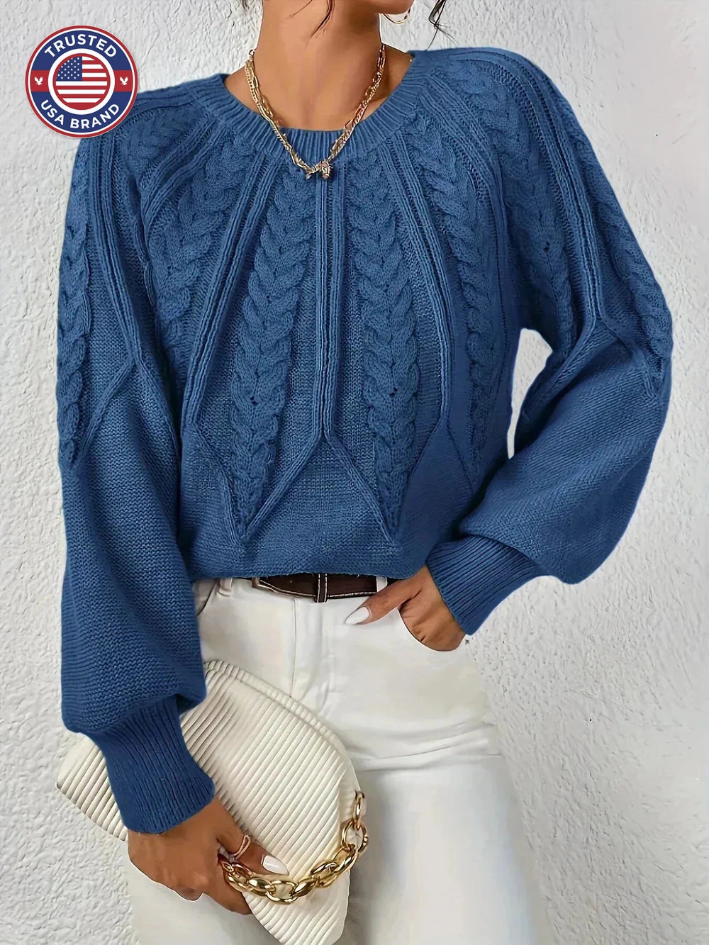 Women's crew neck winter cable knit sweater with varied pattern