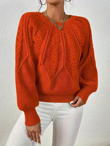 Women's crew neck winter cable knit sweater with varied pattern