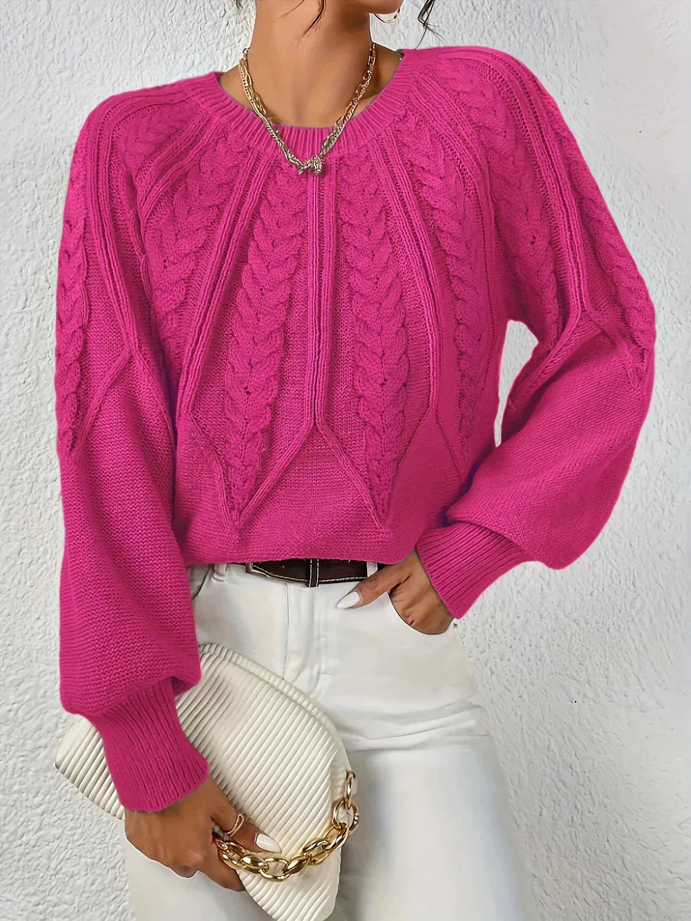Women's crew neck winter cable knit sweater with varied pattern