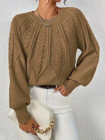 Women's crew neck winter cable knit sweater with varied pattern