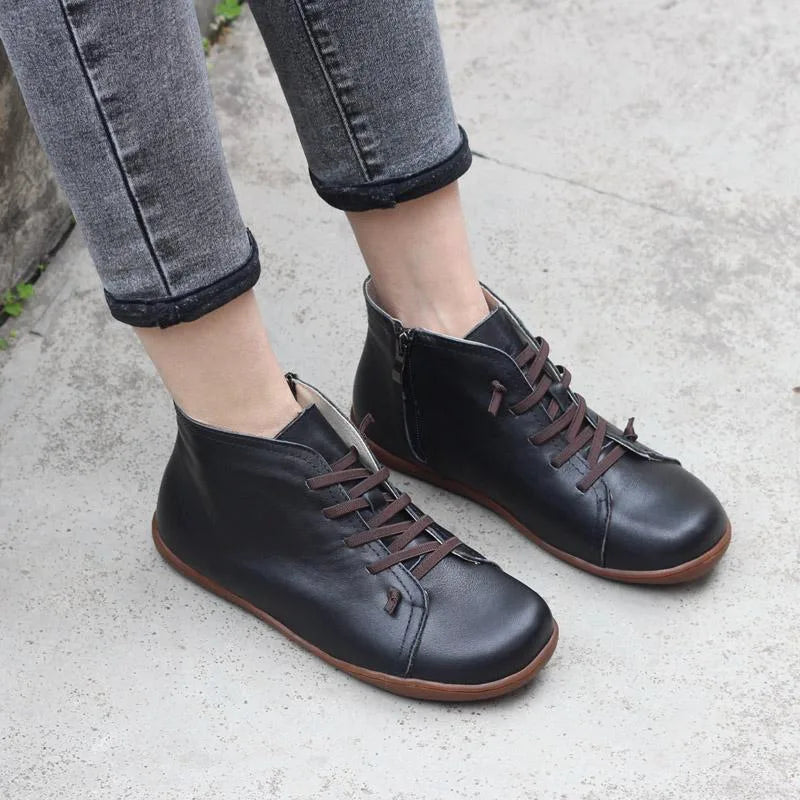 Women's faux leather lace-up ankle winter boots with side zip and flat sole