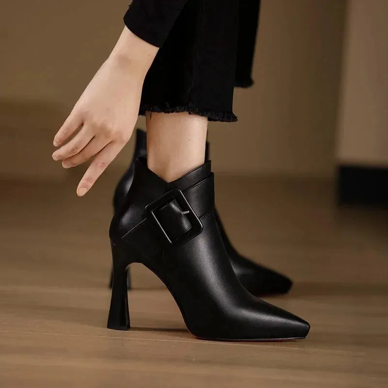 Women's faux leather side zip ankle winter boots with large buckle