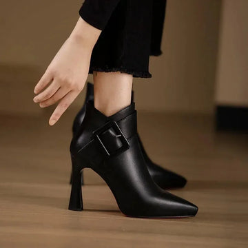 Women's faux leather side zip ankle winter boots with large buckle