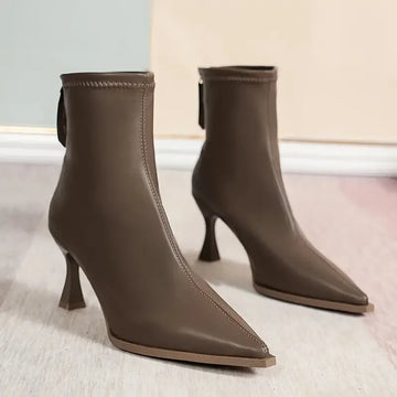 Women's faux leather side zip ankle winter boots with 'uim' lettering