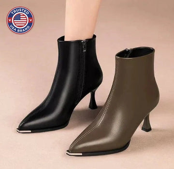 Women's faux leather side zip ankle winter boots with 'uim' lettering