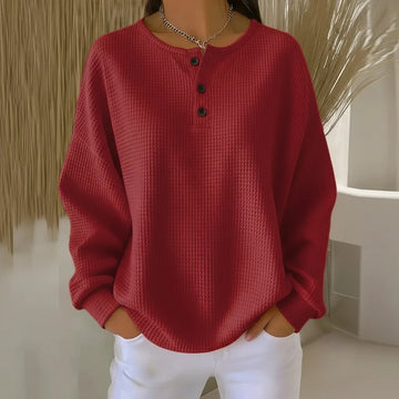 Women's knit crew neck winter sweater with button placket