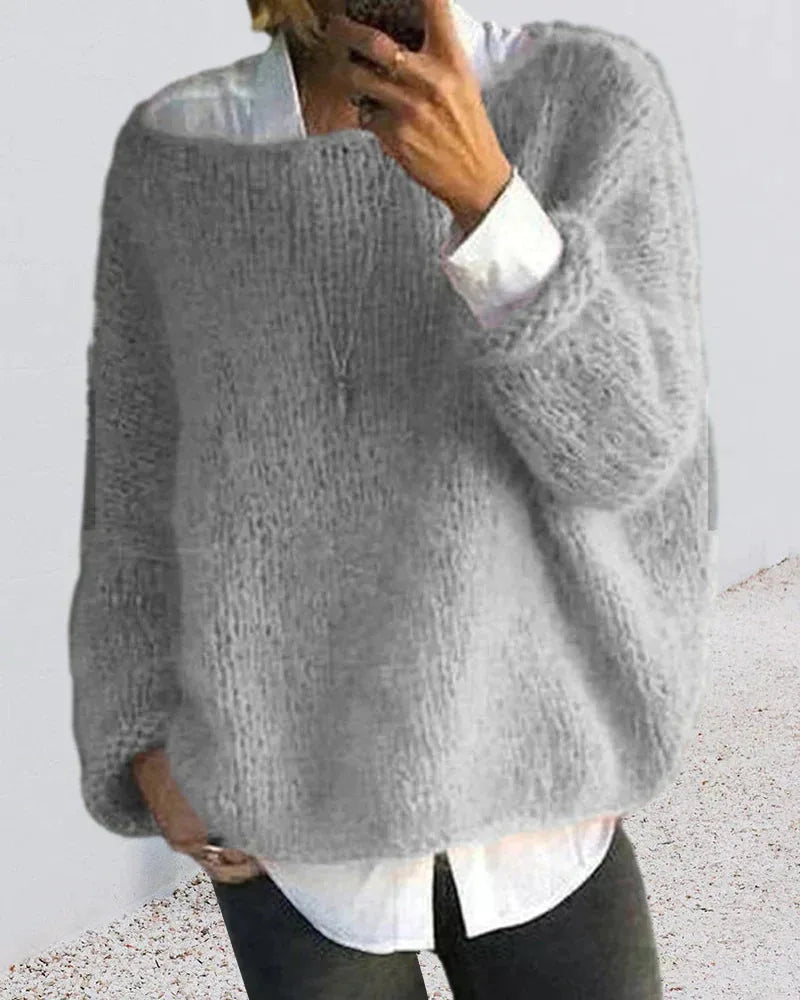 Women's knit crew neck winter sweater with fuzzy texture