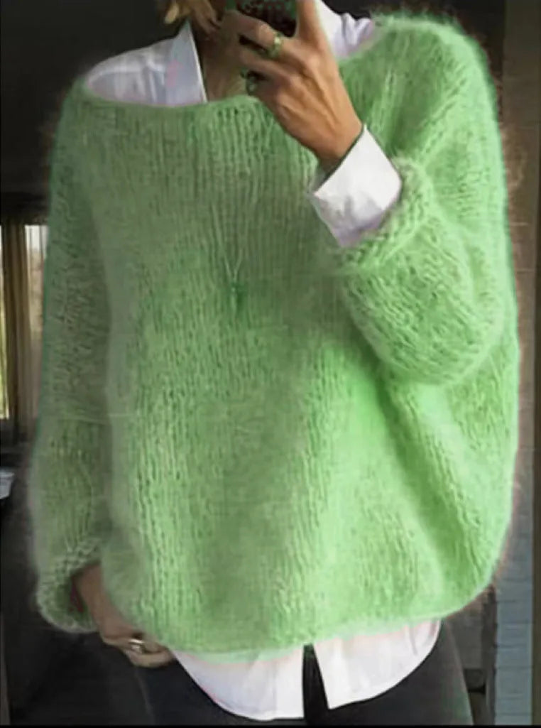 Women's knit crew neck winter sweater with fuzzy texture