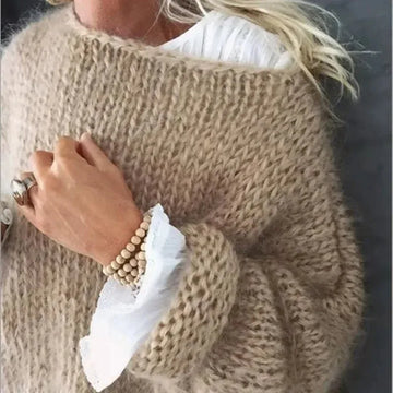 Women's knit crew neck winter sweater with fuzzy texture