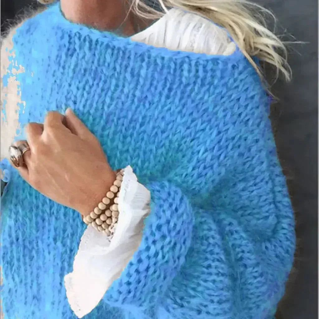 Women's knit crew neck winter sweater with fuzzy texture