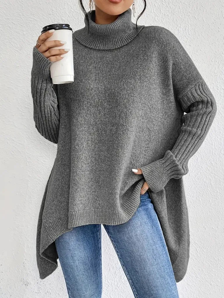 Women's knit winter roll neck sweater with asymmetrical hem