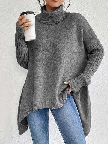 Women's knit winter roll neck sweater with asymmetrical hem