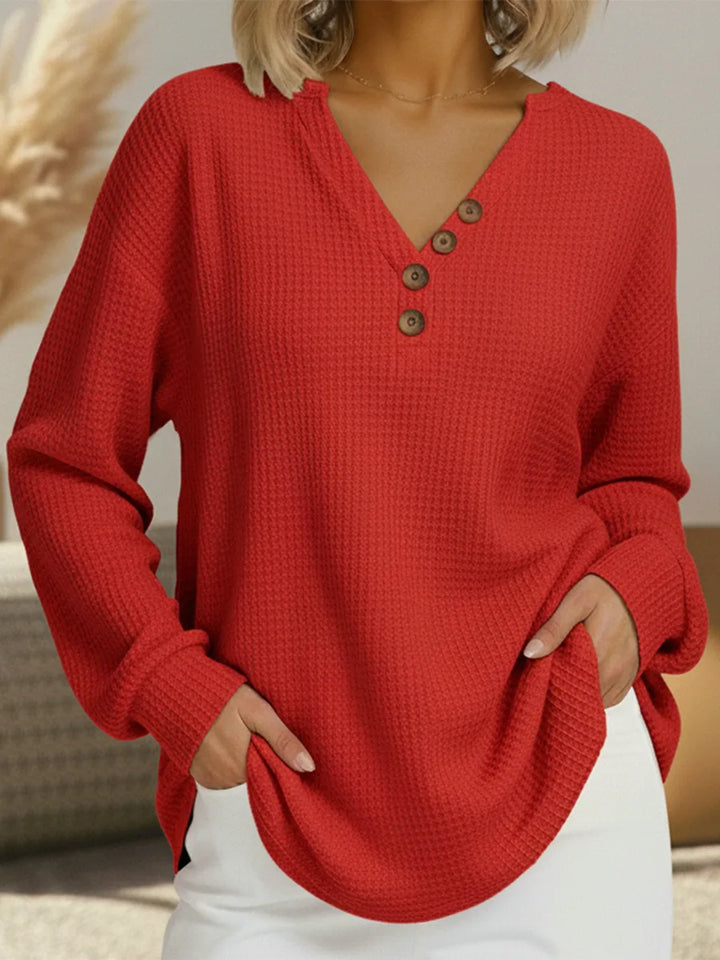 Women's knit v-neck winter sweater with button placket