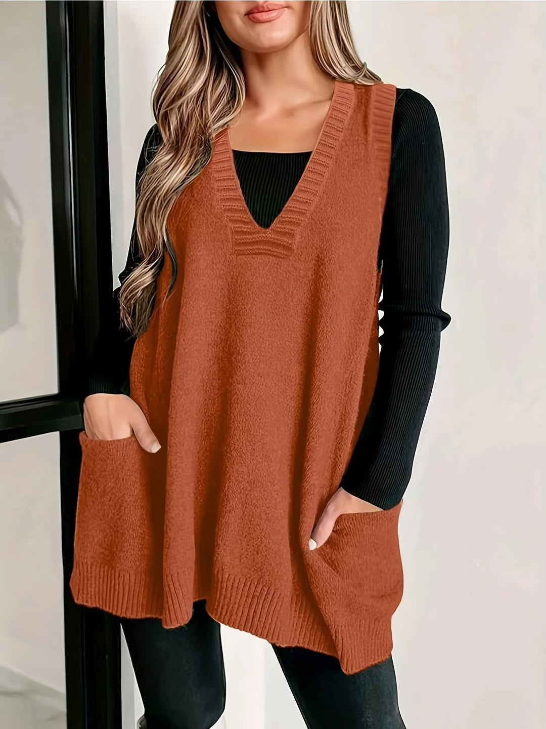 Women's knit v-neck winter sweater with front patch pockets
