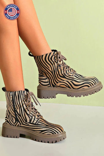 Women's lace-up combat winter boots with zebra print