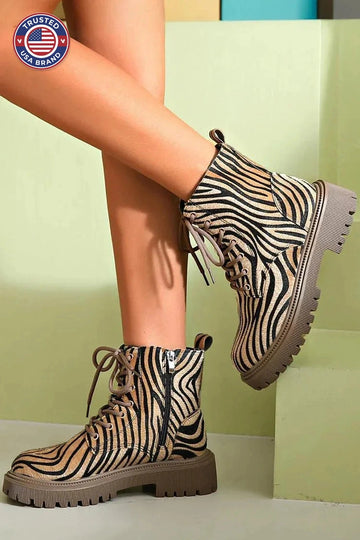 Women's lace-up combat winter boots with zebra print