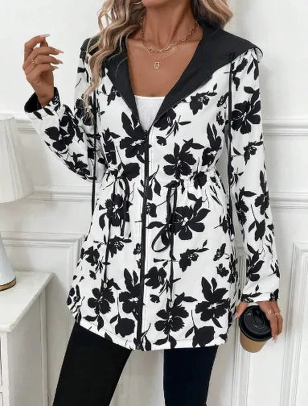 Women's longline zip-up hooded winter parka with drawstring waist