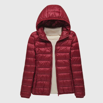 Women's quilted zip-up hooded winter puffer jacket with lightweight padded