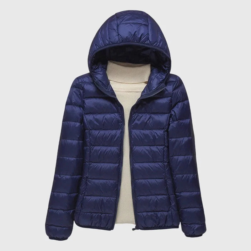 Women's quilted zip-up hooded winter puffer jacket with lightweight padded
