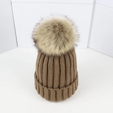 Women's ribbed winter top with detachable faux fur pom-pom