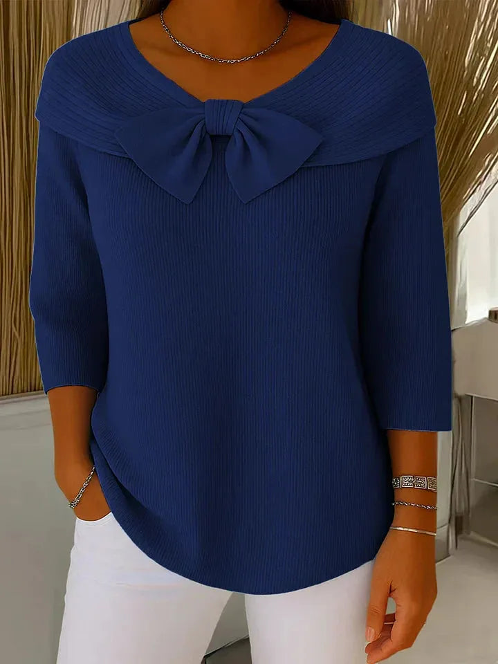 Women's ribbed v-neck winter sweater with large bow detail
