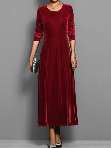Women's velvet crew neck winter midi dress with fitted bodice flared skirt