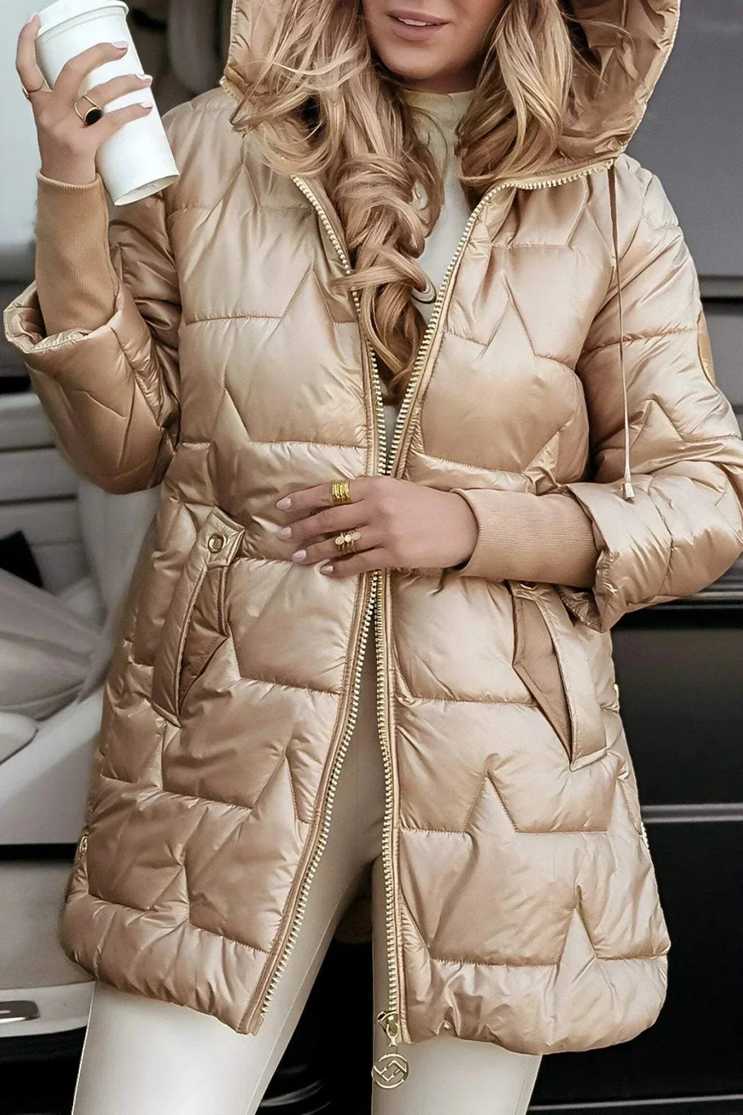 Women's zip-up hooded winter quilted coat with ribbed cuffs