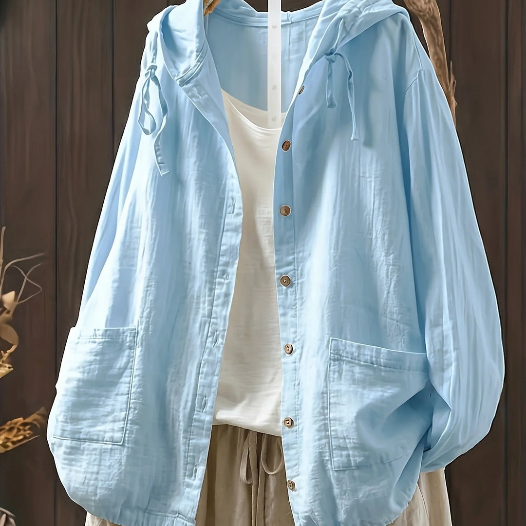 Women's hooded button-up winter puffer jacket in Light Blue