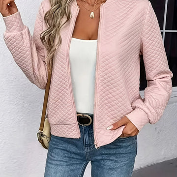 Women's quilted winter bomber jacket with zipper closure in Blush Pink