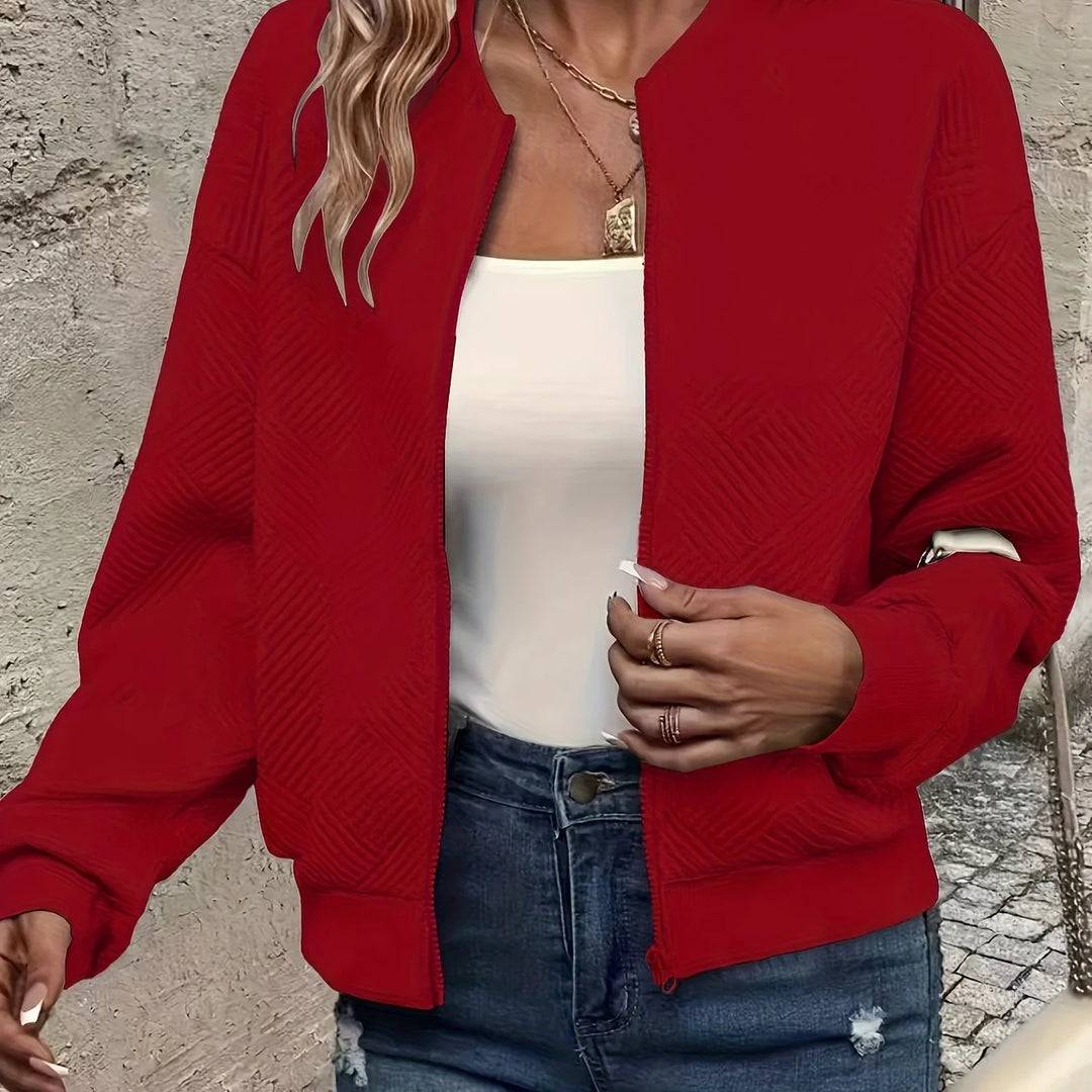 Women's quilted zip-up winter bomber jacket with full zip closure in Red