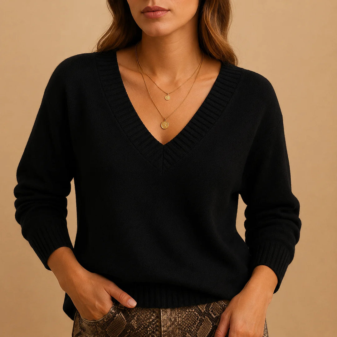 Soft knit winter sweater with ribbed v-neckline and ribbed cuffs in Black