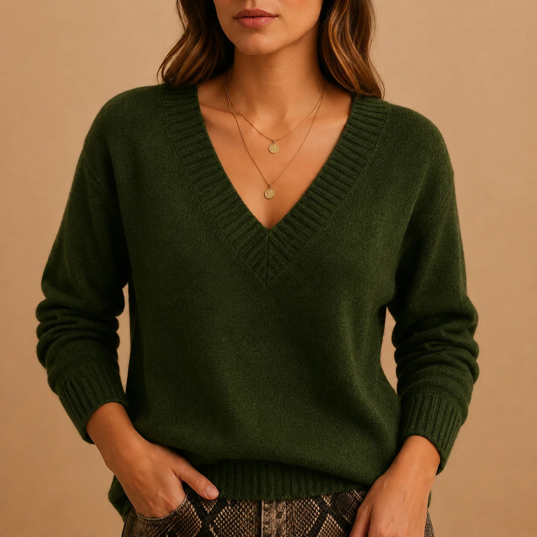 Soft knit winter sweater with ribbed v-neckline and ribbed cuffs in Dark Green