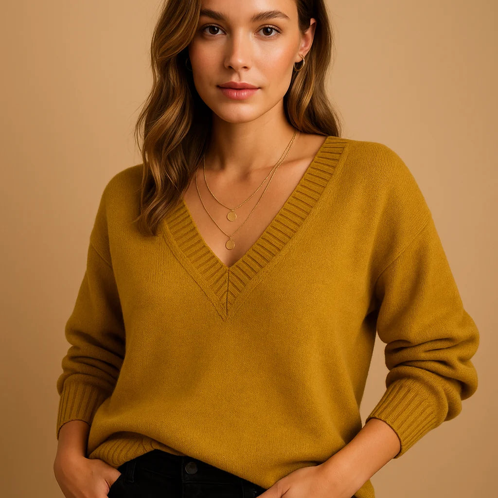 Soft knit winter sweater with ribbed v-neckline and ribbed cuffs in Yellow