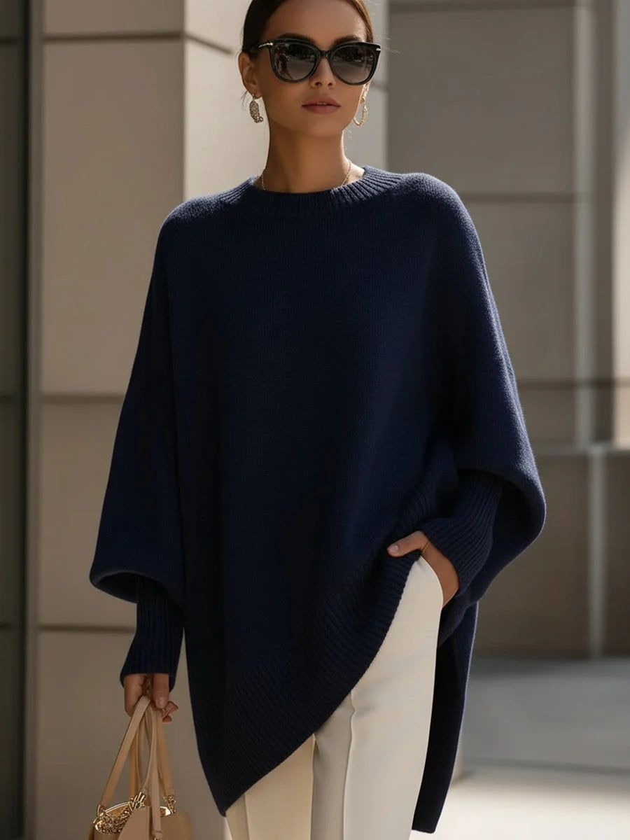 Women's knit crew neck winter sweater with asymmetrical hem