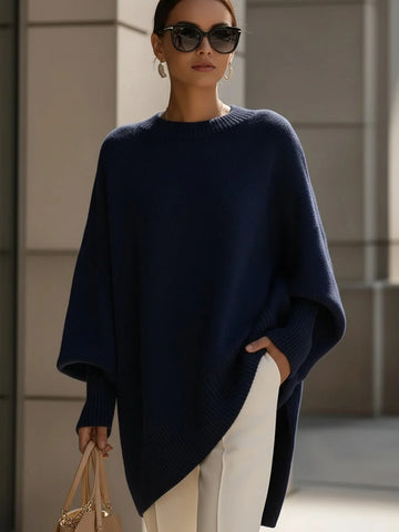Women's knit crew neck winter sweater with asymmetrical hem