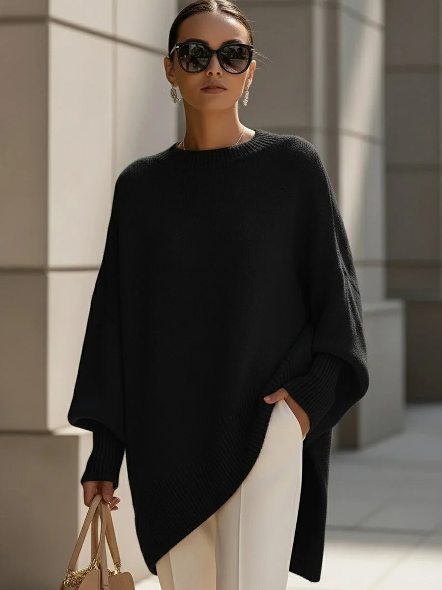 Women's knit crew neck winter sweater with asymmetrical hem