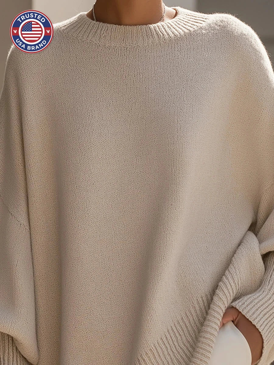 Women's knit crew neck winter sweater with asymmetrical hem