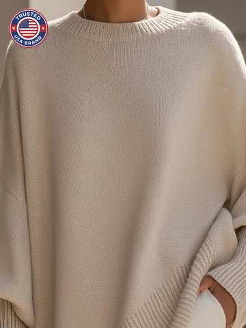 Women's knit crew neck winter sweater with asymmetrical hem