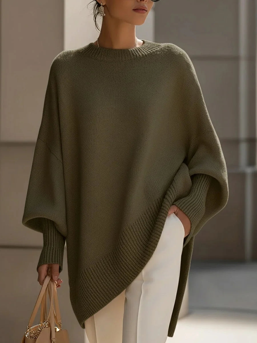 Women's knit crew neck winter sweater with asymmetrical hem