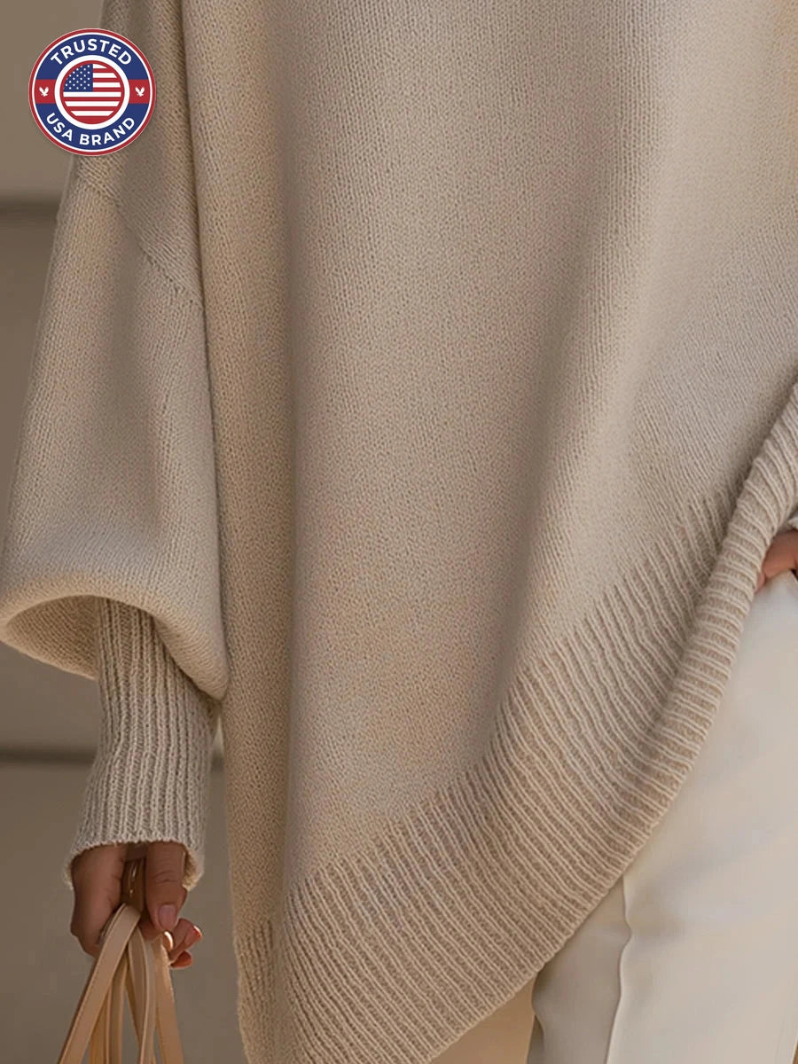 Women's knit crew neck winter sweater with asymmetrical hem