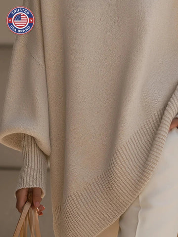 Women's knit crew neck winter sweater with asymmetrical hem