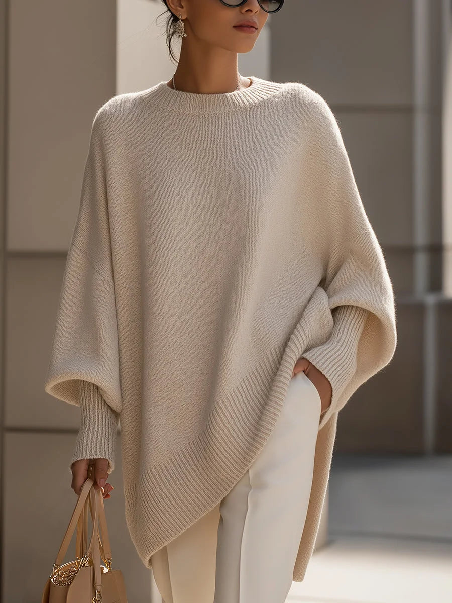 Women's knit crew neck winter sweater with asymmetrical hem