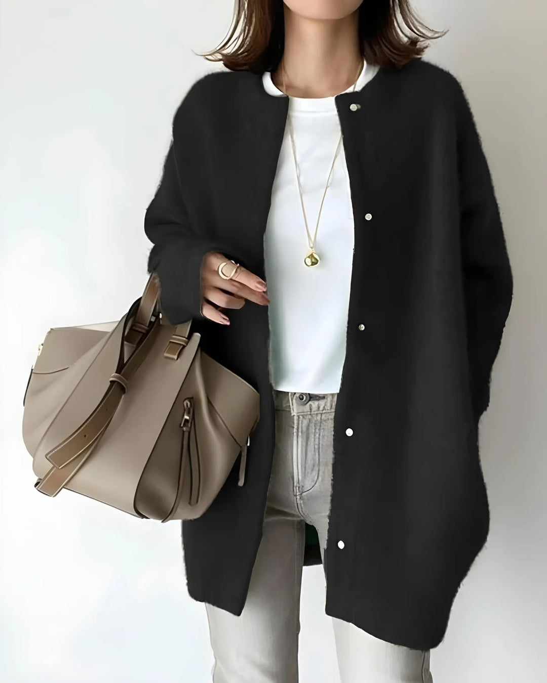 Women's crew neck winter cardigan with snap button closure in Black