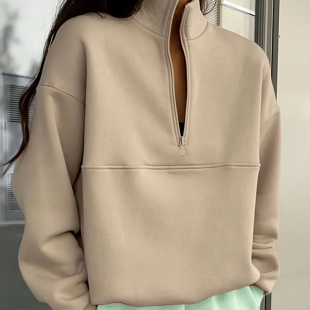 Women's winter quarter zip sweater with stand collar and half-zip closure in Apricot