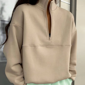 Women's winter quarter zip sweater with stand collar and half-zip closure in Apricot