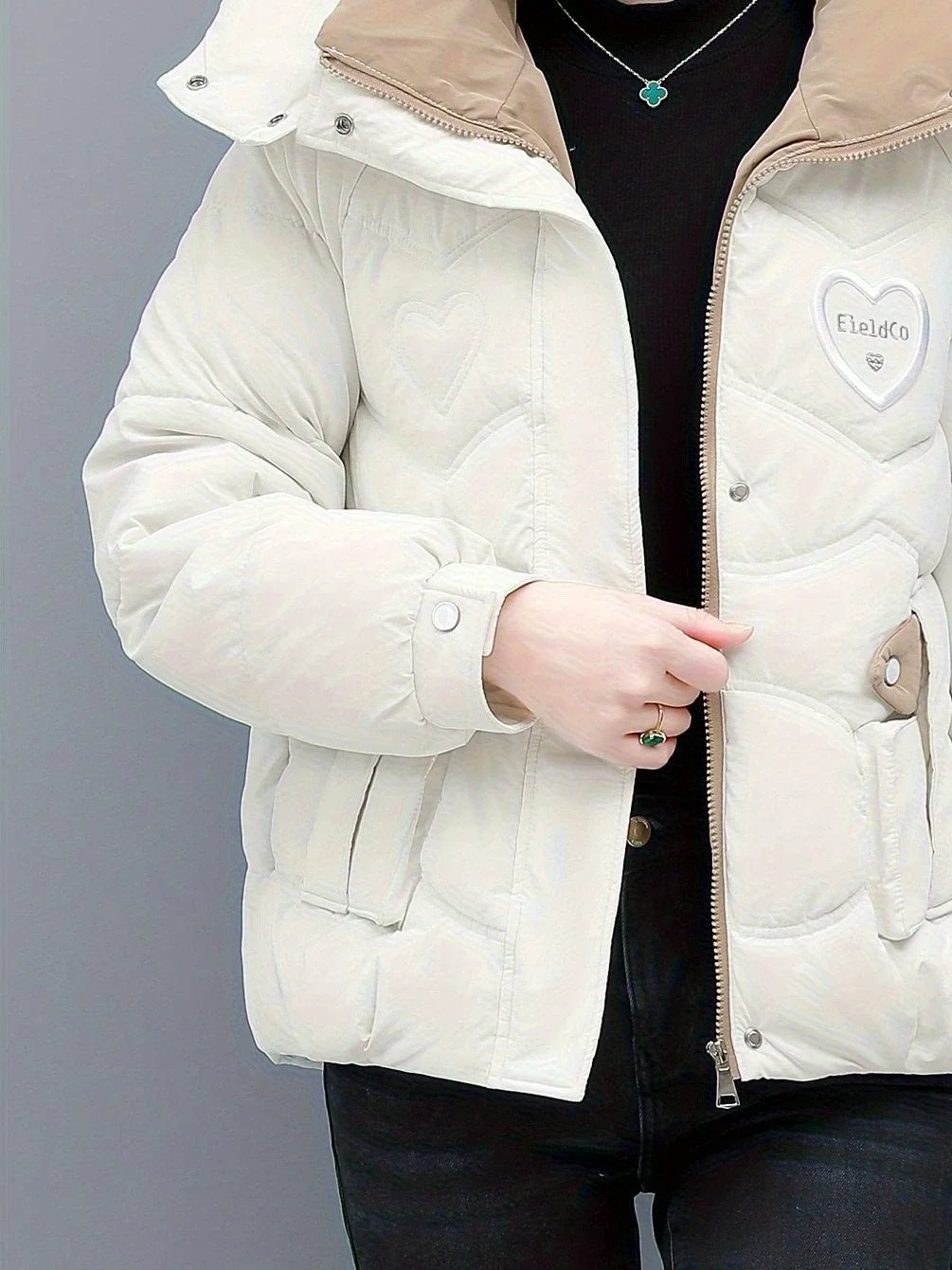 Women's hooded winter puffer jacket with padded construction in White