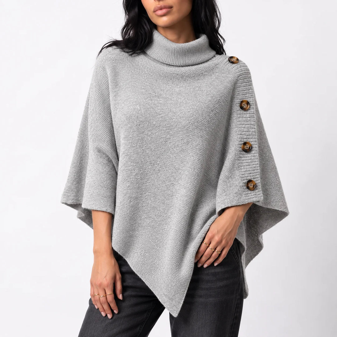 Women’s knitted turtleneck winter poncho with buttons and asymmetric hem in Gray
