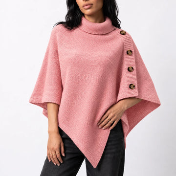 Women’s knitted turtleneck winter poncho with buttons and asymmetric hem in Pink